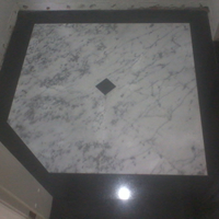 Hall Elevador Carrara com Preto Absoluto